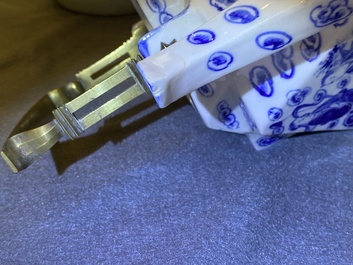 Two large Chinese blue and white and three famille rose teapots, 19/20th C.