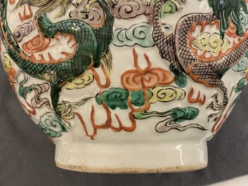 A Chinese famille verte relief-moulded double gourd 'dragon' vase on wooden stand, 19/20th C.