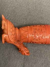 A Chinese carved red coral snuff bottle with a vase resting on a tortoise, Republic