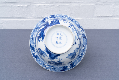 A Chinese blue and white klapmuts bowl with figures in a landscape, Kangxi mark and of the period