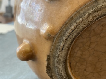 A Chinese monochrome brown-glazed jar, 19th C.