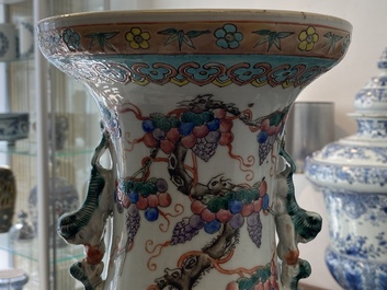 A pair of Chinese famille rose vases with birds among blossoms, 19th C.