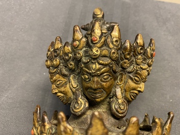 A large Sino-Tibetan coral-inlaid gilt bronze figure of Kapaladhara Hevajra, 18/19th C.