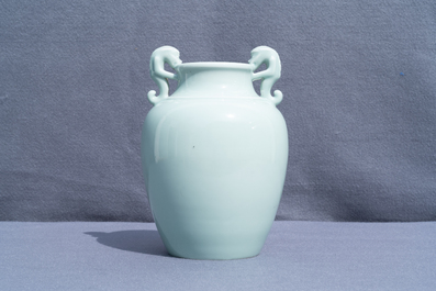 A Chinese monochrome dragon-handled celadon vase, Qianlong mark, 19/20th C.