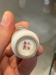 Five Chinese blue and white, iron- and copper-red snuff bottles, 19th C.