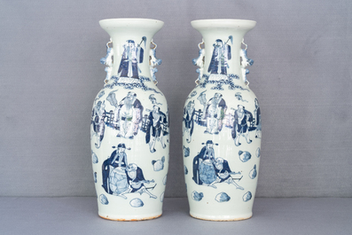 A pair of Chinese blue and white celadon vases with figures, 19th C.