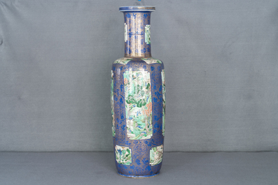 A massive Chinese famille verte on powder blue-ground rouleau vase, Kangxi