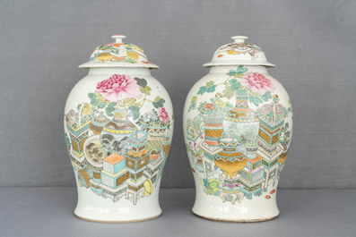 Two Chinese qianjiang cai vases and covers with antiquities, 19th C.