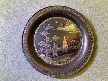 A pair of Chinese lac burgaut&eacute; saucer dishes, Kangxi