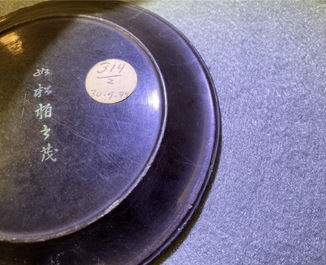 A pair of Chinese lac burgaut&eacute; saucer dishes, Kangxi