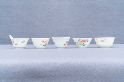 Five Chinese famille rose cups and saucers, Yongzheng/Qianlong