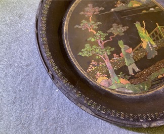 A pair of Chinese lac burgaut&eacute; saucer dishes, Kangxi