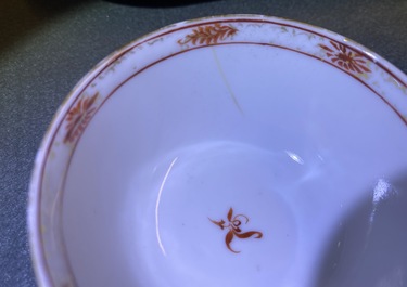 Seven Chinese famille rose 'Mandarin' cups and saucers, Qianlong