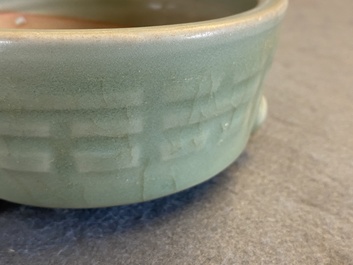 A Chinese Longquan celadon tripod censer with trigrams, Ming