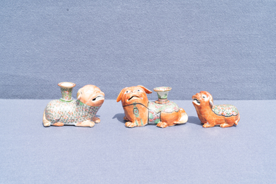 Three Chinese Canton famille rose models of dogs, two with candle holders, 19th C.