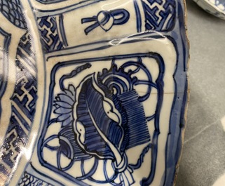 A Chinese blue and white kraak porcelain charger, a vase, a crow cup and a small plate, Wanli