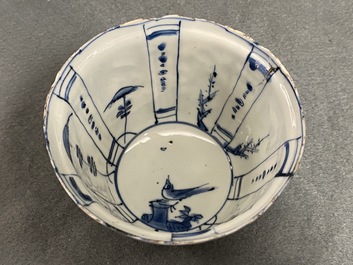 A Chinese blue and white kraak porcelain charger, a vase, a crow cup and a small plate, Wanli