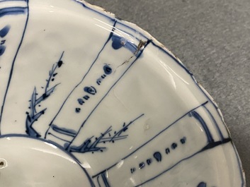 A Chinese blue and white kraak porcelain charger, a vase, a crow cup and a small plate, Wanli