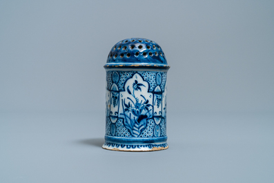 A Dutch Delft blue and white caster, 18th C.