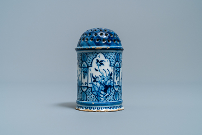 A Dutch Delft blue and white caster, 18th C.