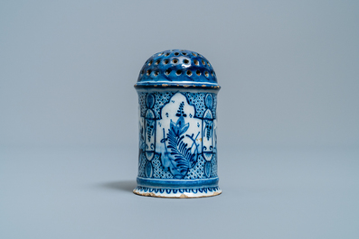 A Dutch Delft blue and white caster, 18th C.