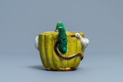 A Chinese verte biscuit water dropper, 19th C.