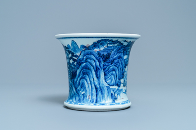 A fine Chinese blue, white and copper red 'Master of the Rocks' brush pot, Kangxi