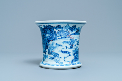 A fine Chinese blue, white and copper red 'Master of the Rocks' brush pot, Kangxi