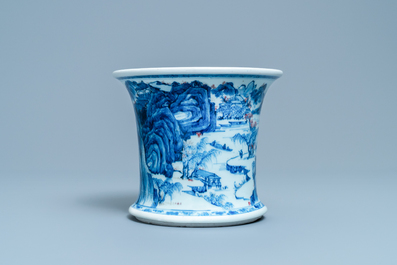 A fine Chinese blue, white and copper red 'Master of the Rocks' brush pot, Kangxi