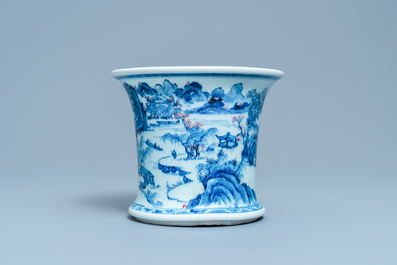 A fine Chinese blue, white and copper red 'Master of the Rocks' brush pot, Kangxi