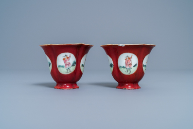 A pair of Chinese famille rose ruby-ground wine cups with foreigners, Qianlong