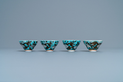 Four Chinese blue-ground Dayazhai-style 'dragon' cups and saucers, 19th C.