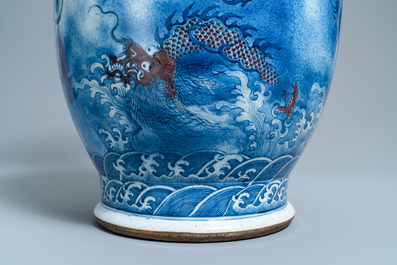 A large Chinese blue, white and copper red 'dragon' vase, Jiaqing