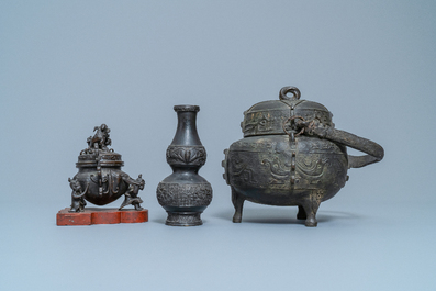 Two Chinese bronze censers, a vase and a mirror, Ming and later