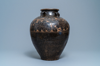 A large Chinese Cizhou vase with engraved floral design, Yuan/Ming