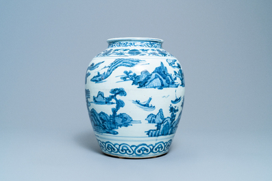 Un vase en porcelaine de Chine en bleu et blanc &agrave; d&eacute;cor de bateaux dans un paysage montagneux, Ming