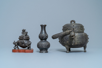 Two Chinese bronze censers, a vase and a mirror, Ming and later