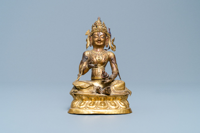 A Sino-Tibetan gilt copper alloy figure of Buddha, 18/19th C.