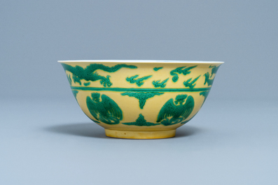 An imperial Chinese green and yellow enamelled 'dragon and phoenix' bowl, Kangxi mark and of the period