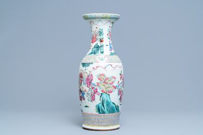 A Chinese famille rose vase with figures in a landscape, 19th C.