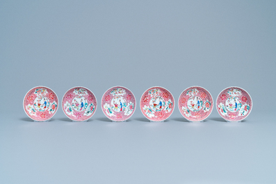 Six Chinese famille rose cups and saucers with a lady and a boy, Yongzheng/Qianlong