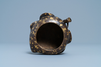 A Chinese gold-splashed bronze peach-form censer, Xuande mark, 18th C.