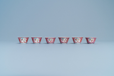 Six Chinese famille rose cups and saucers with a lady and a boy, Yongzheng/Qianlong