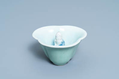 A Chinese blue, white and celadon-glazed 'Lu Hong Jian' puzzle or trick cup, Qianlong