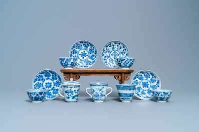 Four Chinese blue and white cups and saucers and three large cups, Kangxi/Qianlong