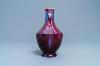 A Chinese monochrome flamb&eacute;-glazed vase, incised Qianlong mark, 18/19th C.