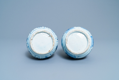 A pair of Chinese blue and white 'garlic head' bottle vases, Wanli