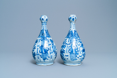 A pair of Chinese blue and white 'garlic head' bottle vases, Wanli