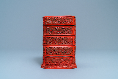 A Chinese red cinnabar lacquer four-tiered box, Wanli