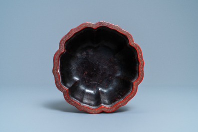 A Chinese carved cinnabar lacquer jardini&egrave;re, Yongzheng/Qianlong